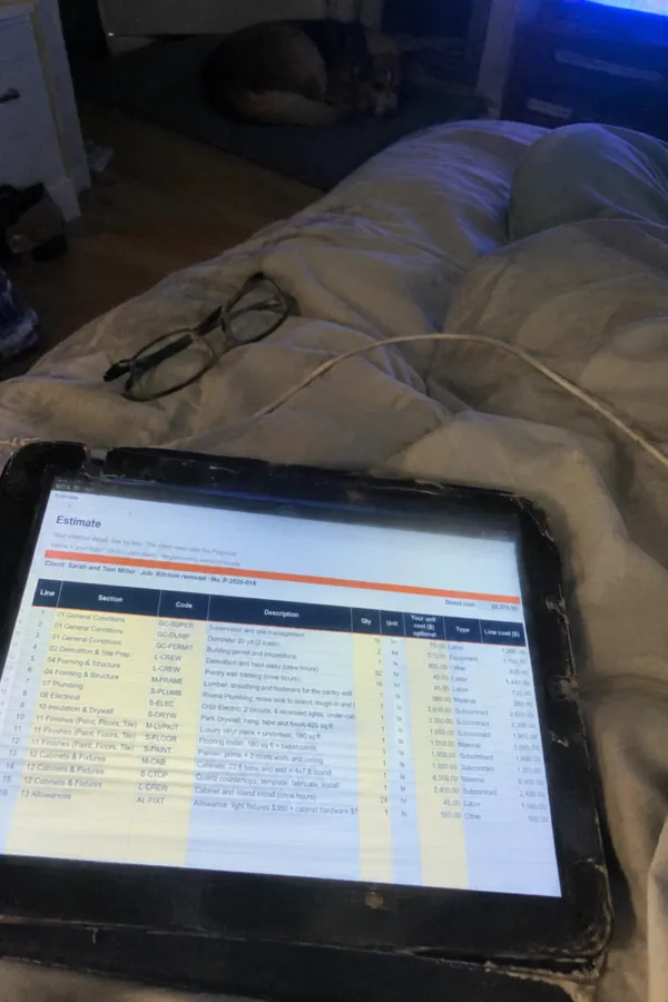 Estimate template open on a tablet in bed at night